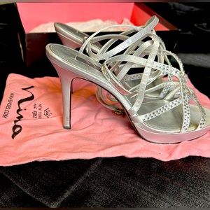 Nina size 9 1/2 woman’s silver and rhinestone strappy heel dress shoes